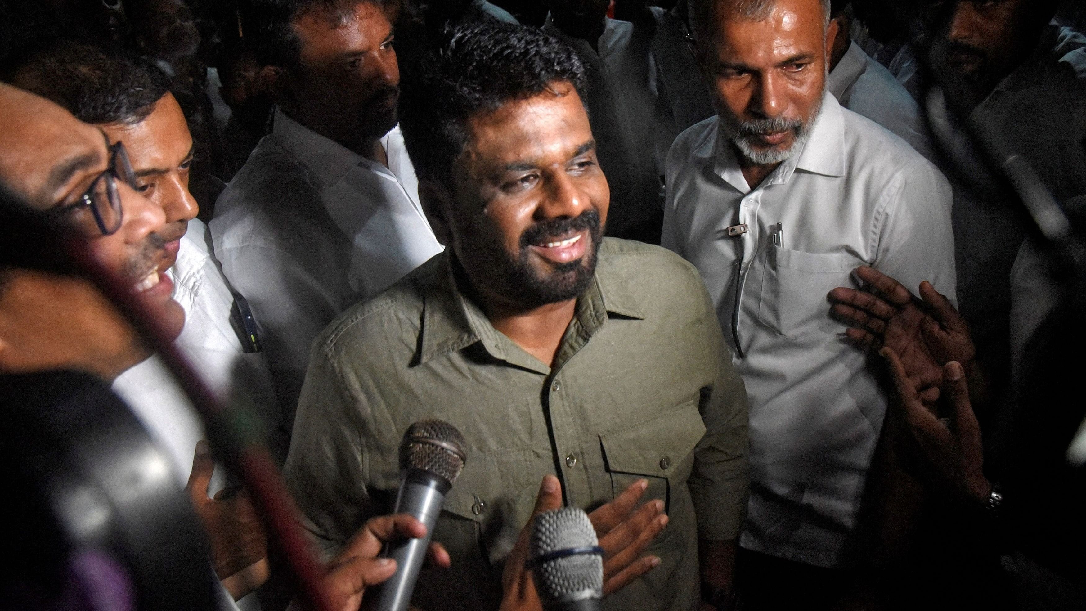 <div class="paragraphs"><p>Anura Kumara Dissanayake, the presidential candidate from National People's Power, speaks to the press as he heads to the Election Commission, a day after the presidential election, in Colombo, Sri Lanka, September 22, 2024. </p></div>