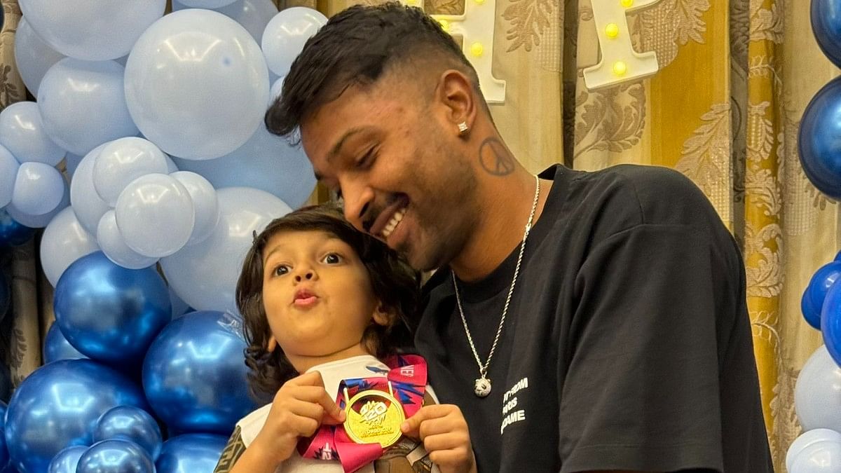 <div class="paragraphs"><p>India all-rounder Hardik Pandya with his son Agastya</p></div>