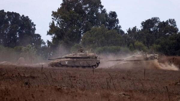 <div class="paragraphs"><p>Israeli tanks are being moved, amid cross-border hostilities between Hezbollah and Israel, in the Israeli-occupied Golan Heights September 22, 2024.</p></div>