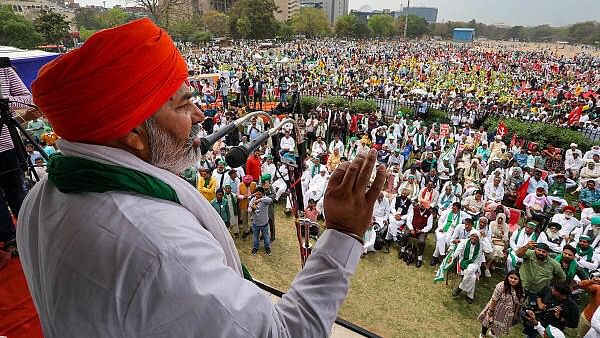 <div class="paragraphs"><p>File photo of Bharatiya Kisan Union (BKU) leader Rakesh Tikait addressing a crowd during 'Kisan Mahapanchayat', organised by Samyukt Kisan Morcha (SKM), at Ramlila Maidan in New Delhi.</p></div>