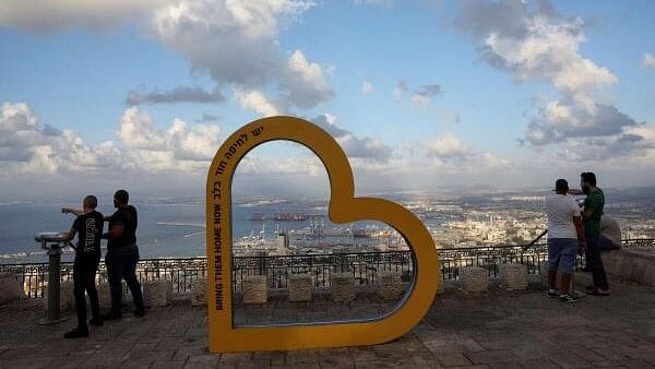 <div class="paragraphs"><p>People look over the city of Haifa.</p></div>