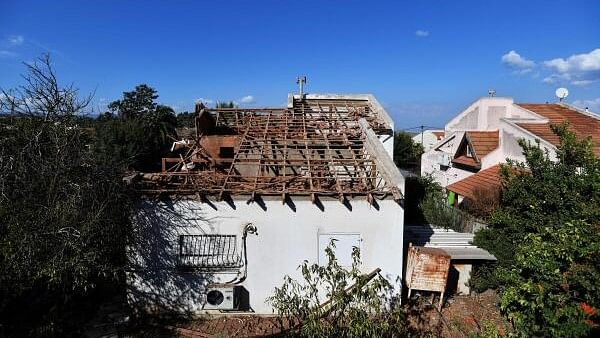 <div class="paragraphs"><p>A view of a damaged house, that was hit by a rocket fired from Lebanon into Israel, amid cross-border hostilities between Hezbollah and Israel, in Givat Avni, northern Israel September 23, 2024. </p></div>