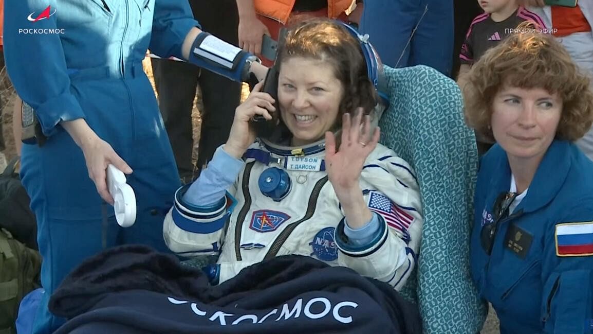 <div class="paragraphs"><p>Crew member of the ISS, NASA astronaut Tracy Dyson speaks on the phone after landing in the Soyuz MS-25 space capsule in a remote area near Zhezkazgan, Kazakhstan on Monday (September 23).</p></div>