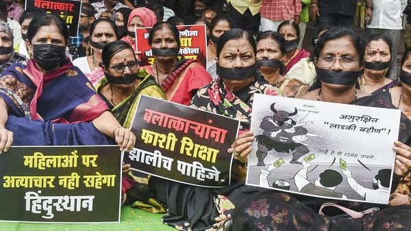 <div class="paragraphs"><p>Maha Vikas Aghadi (MVA) leaders and workers protest over the Badlapur sexual assault case, in Karad.</p></div>