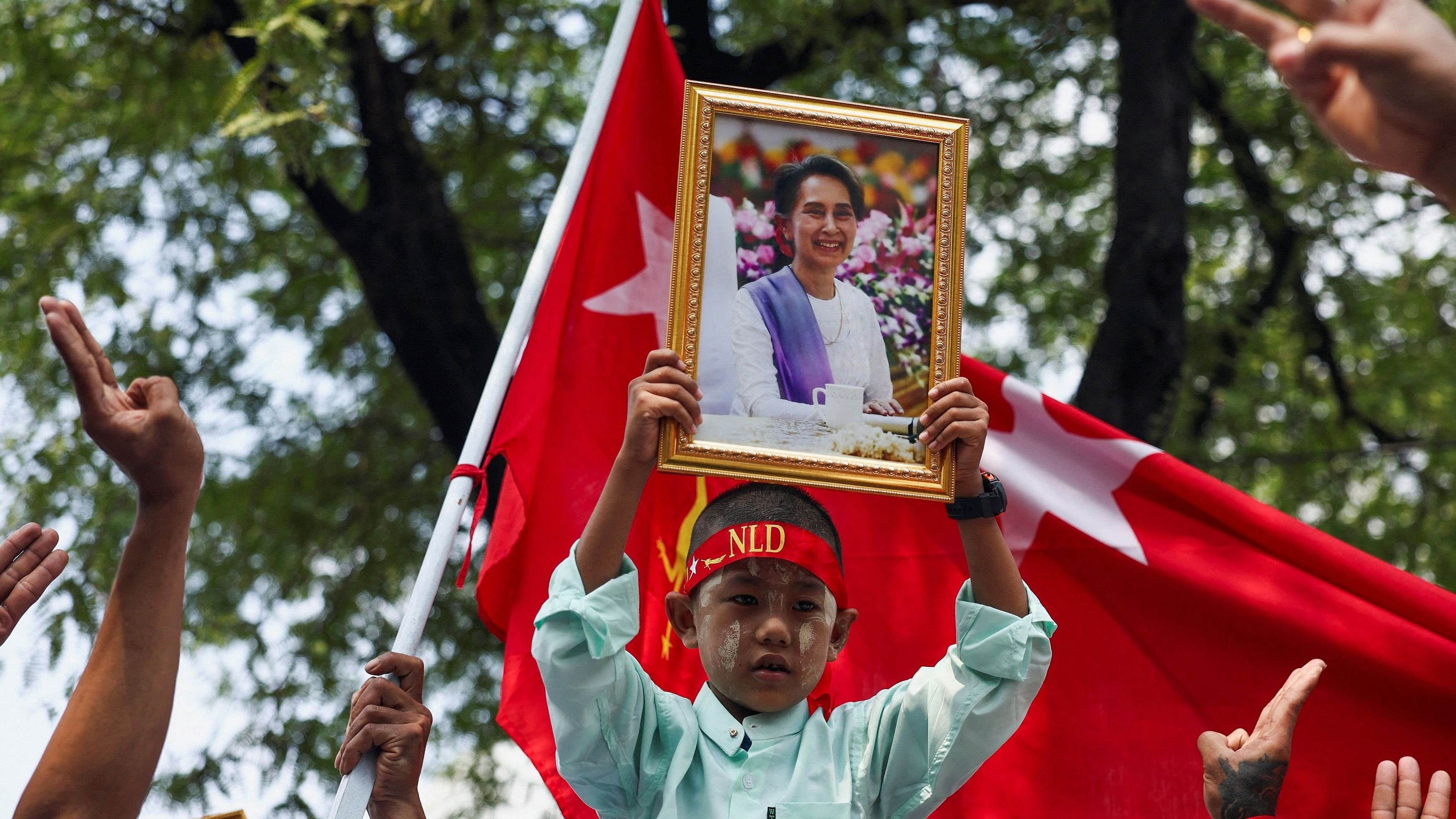 <div class="paragraphs"><p>A protester holds up a portrait of Aung San Suu Kyi during a demonstration to mark the third anniversary of Myanmar’s 2021 military coup, outside of the United Nations office in Bangkok, Thailand, February 1, 2024. </p></div>