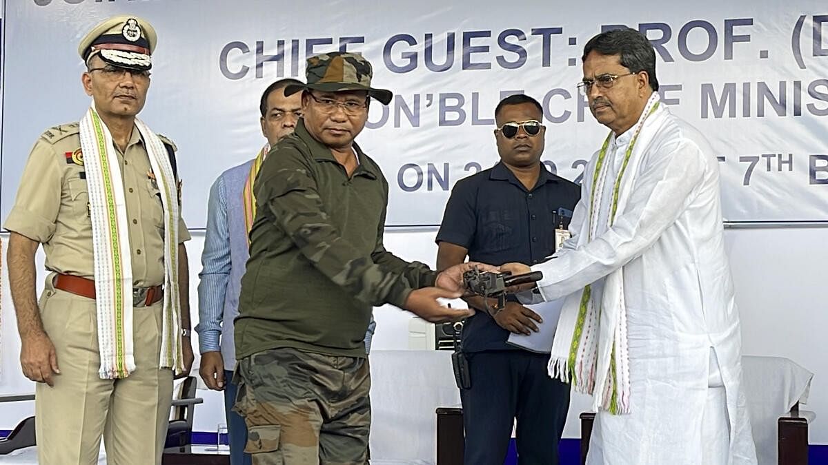 <div class="paragraphs"><p>Tripura CM Manik Saha receives arms from an extremist during a surrender ceremony in West Tripura on Tuesday (September 24).&nbsp;</p></div>