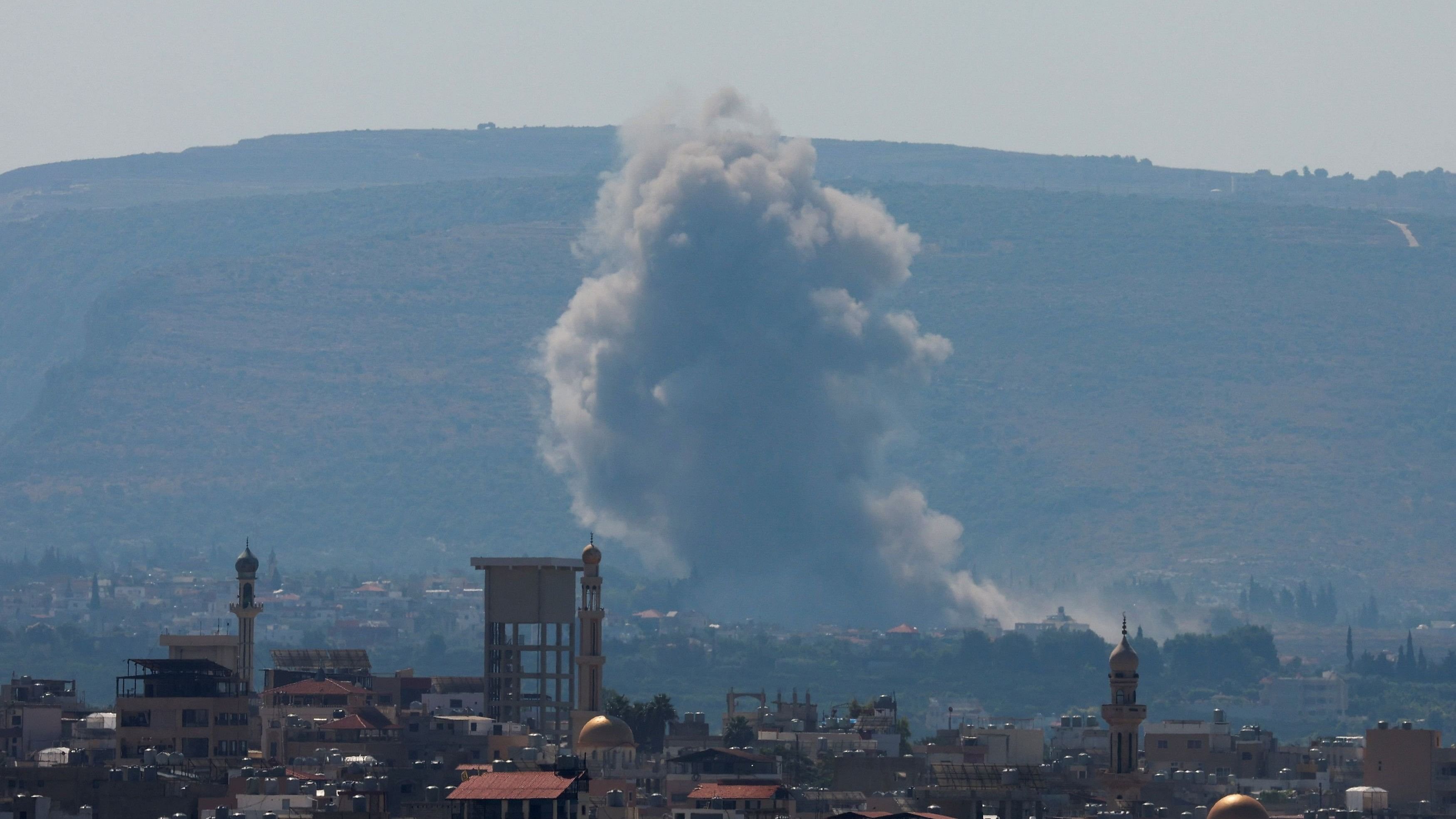 <div class="paragraphs"><p>Smoke billows over southern Lebanon, amid ongoing cross-border hostilities between Hezbollah and Israeli forces, as seen from Tyre, southern Lebanon September 24, 2024.</p></div>