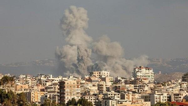 <div class="paragraphs"><p>Smokes rise, amid ongoing cross-border hostilities between Hezbollah and Israeli forces, in Tyre, southern Lebanon.&nbsp;</p></div>