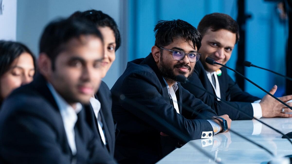 <div class="paragraphs"><p>Indian team's non-playing captain and coach Srinath Narayanan (second from right) at the press conference after India's triumph.  </p></div>