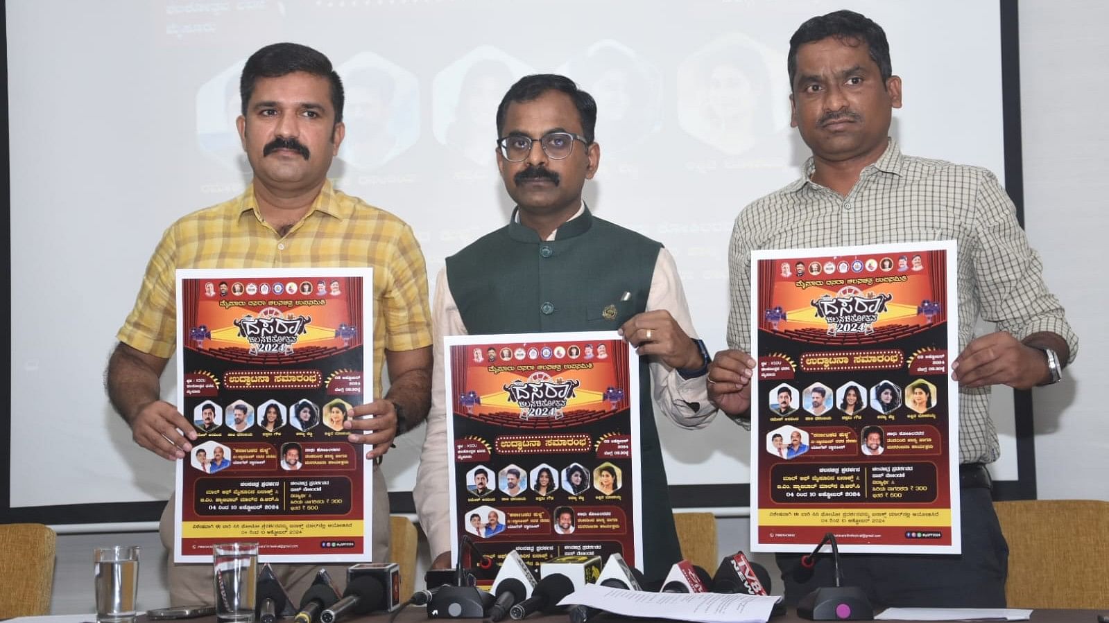 <div class="paragraphs"><p>DCF (territorial) and Deputy Special Officer Dasara Film Fest K N Basavaraju, Joint Director of Social Welfare Department and working President of the Fest Rangegowda, Assistant Director of Department of Information and Public Relations and Secretary of the Fest, T K Harish release poster of Dasara Film Fest in Mysuru on Tuesday.</p></div>