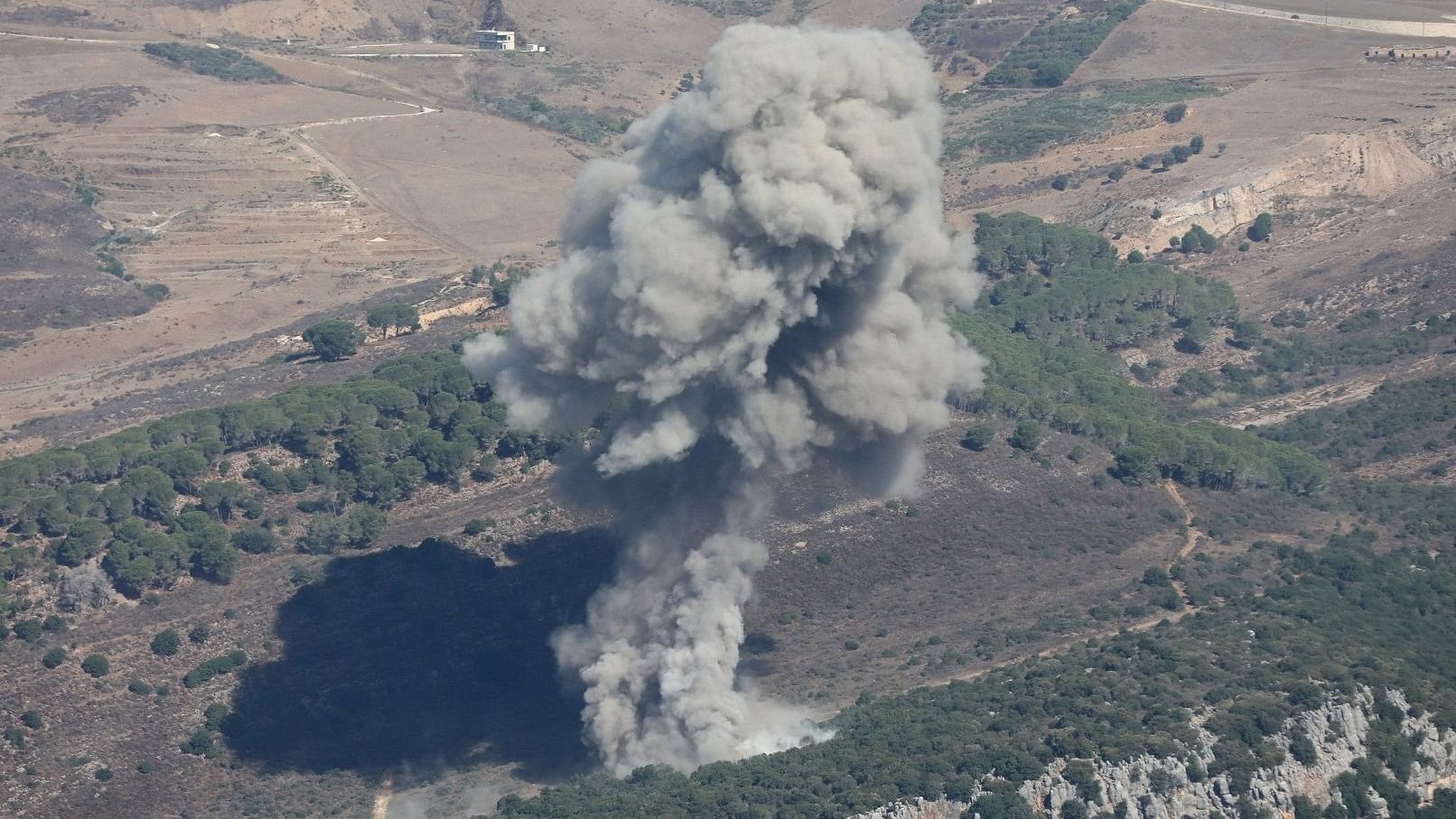 <div class="paragraphs"><p>Smoke billows over southern Lebanon, amid ongoing cross-border hostilities between Hezbollah and Israeli forces, as pictured from Marjayoun, near the border with Israel.</p></div>