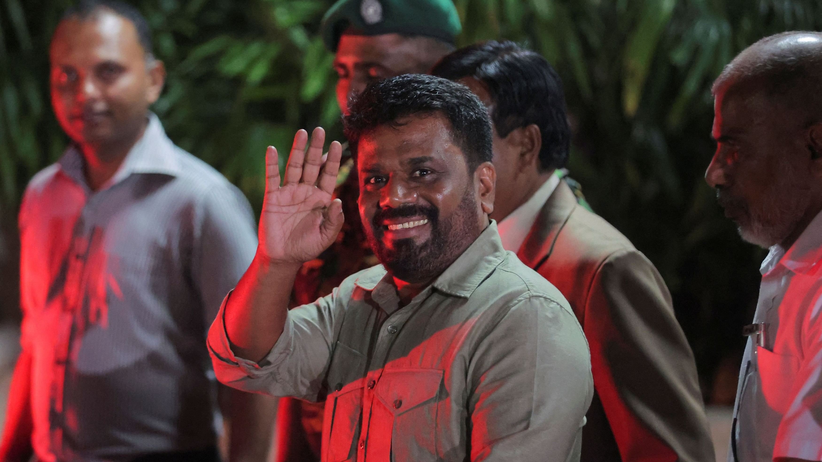 <div class="paragraphs"><p>Anura Kumara Dissanayake, leader of the National People's Power  party, greets as he leaves the election commission after he claimed the victory in the presidential election, in Colombo, Sri Lanka, September 22, 2024. </p></div>