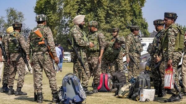 <div class="paragraphs"><p>Security personnel prepare to leave for their designated polling stations on the eve of the second phase of Assembly elections, in Srinagar, Tuesday, September 24, 2024. </p></div>