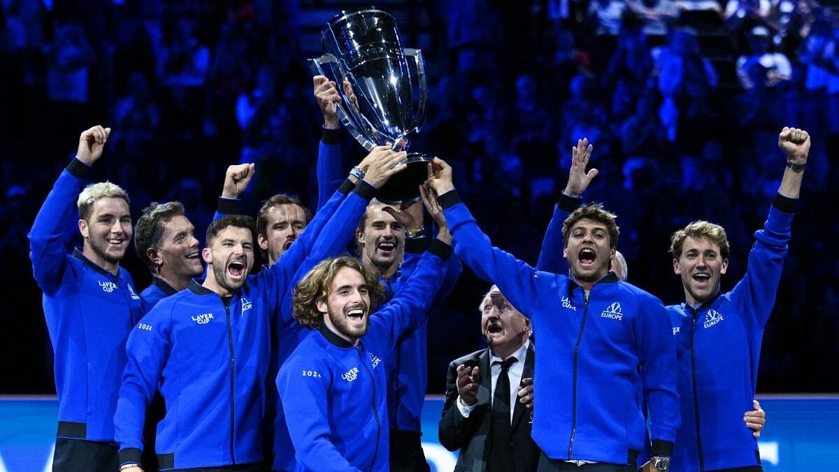 <div class="paragraphs"><p> Team Europe celebrate with the trophy after winning the Laver Cup.</p></div>