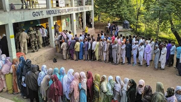 <div class="paragraphs"><p>Voters stand in queues at a polling station to cast votes during the second phase of Jammu and Kashmir Assembly elections, at Surankote constituency of Poonch district, J&amp;K.</p></div>