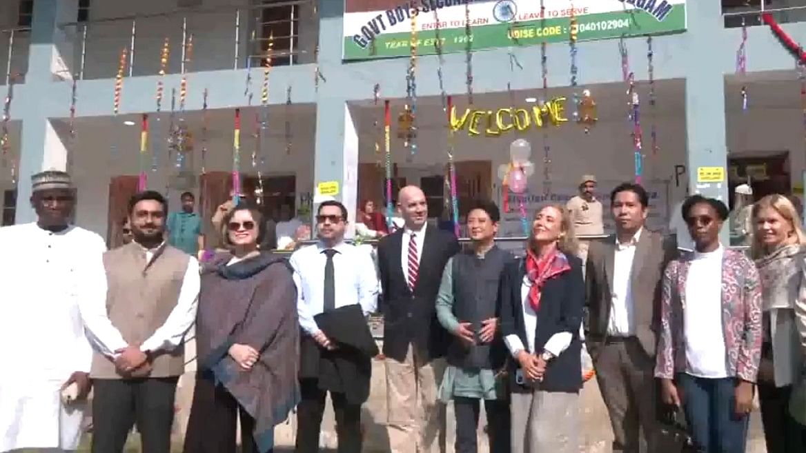 <div class="paragraphs"><p>A delegation of diplomats from various countries arrives at a polling station during the second phase of assembly elections in Srinagar on September 25, 2024.</p></div>