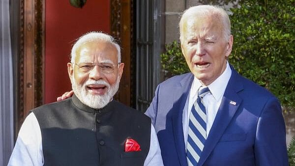 <div class="paragraphs"><p>Joe Biden (right) and Narendra Modi</p></div>