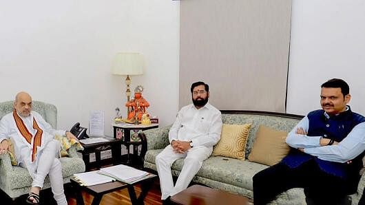 <div class="paragraphs"><p>Amit Shah with Eknath Shinde and Devendra Fadnavis</p></div>