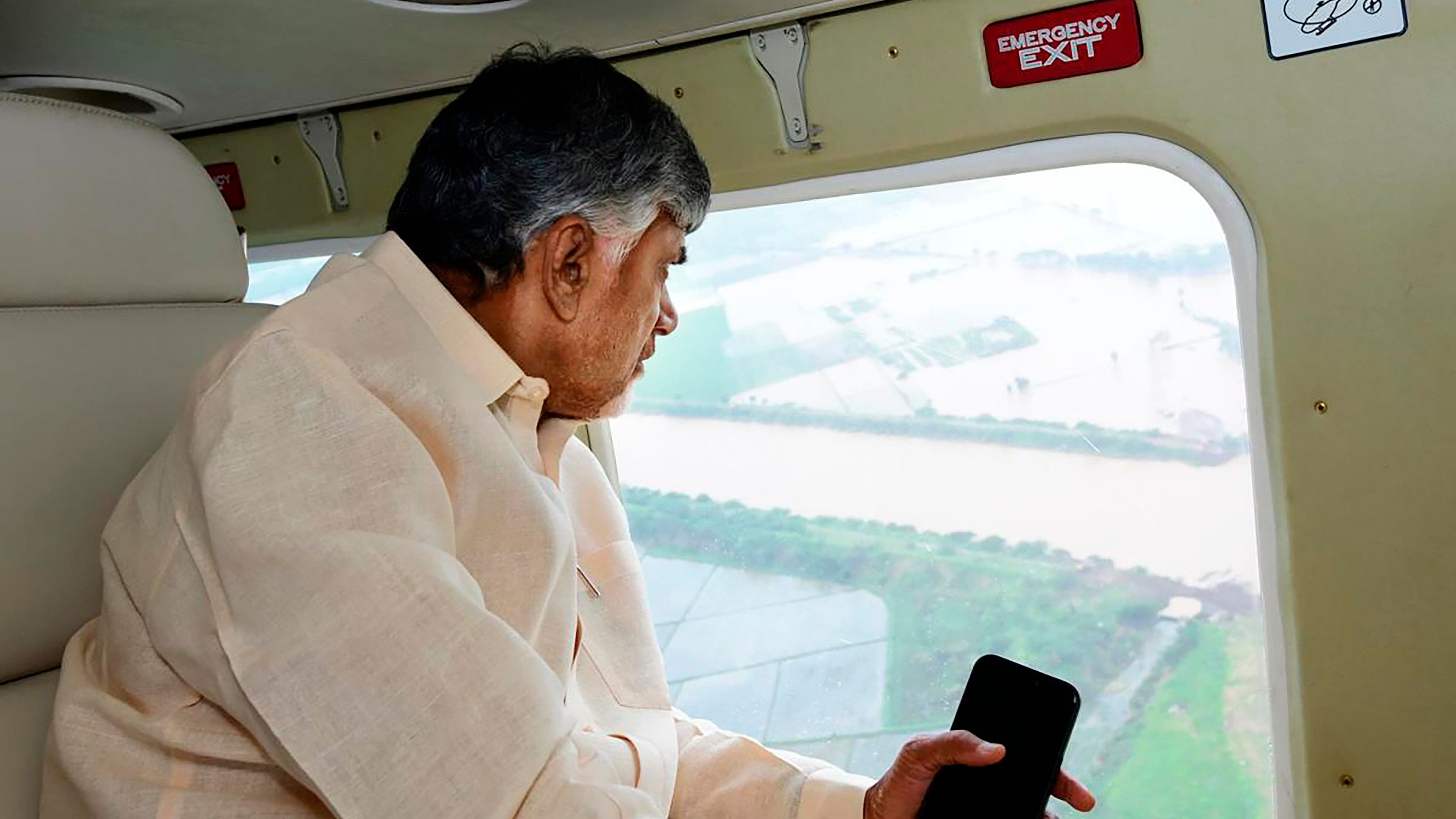 <div class="paragraphs"><p> Andhra Pradesh Chief Minister N Chandrababu Naidu inspects the flood affected areas from a helicopter, from Budameru to Kolleru and then Hamsala Devi and the condition of Lankan villages in the Krishna River. </p></div>