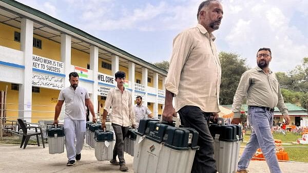 <div class="paragraphs"><p>Electronic Voting Machines (EVMs) and other election material being shifted to the counting centre from a strong room, a day after voting in the second phase of J&amp;K Assembly elections</p></div>