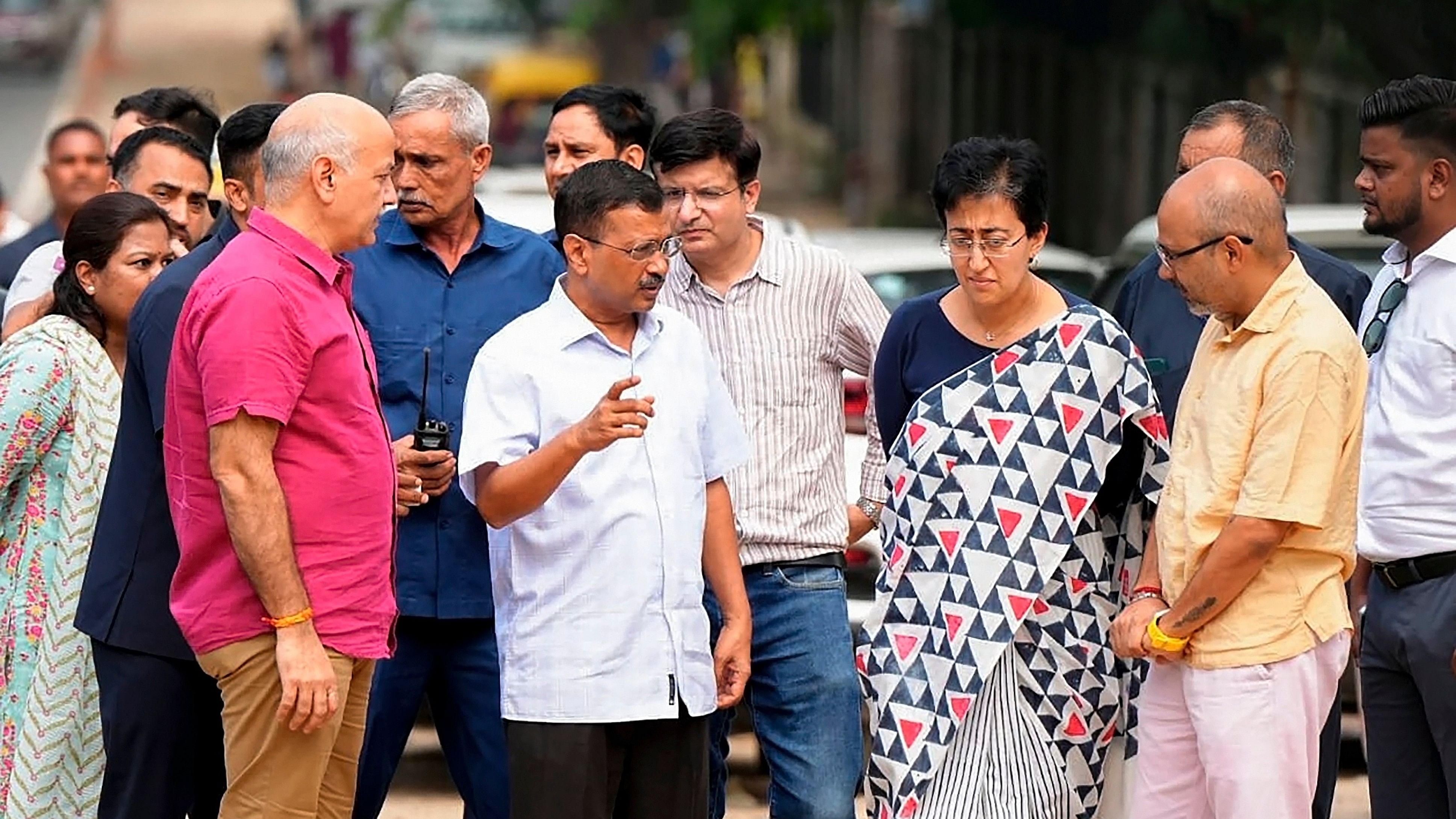 <div class="paragraphs"><p> Delhi Chief Minister Atishi with former chief minister Arvind Kejriwal and former deputy chief minister Manish Sisodia inspects roadwork in the Delhi University area, in New Delhi, Thursday, Sept. 26, 2024. </p></div>