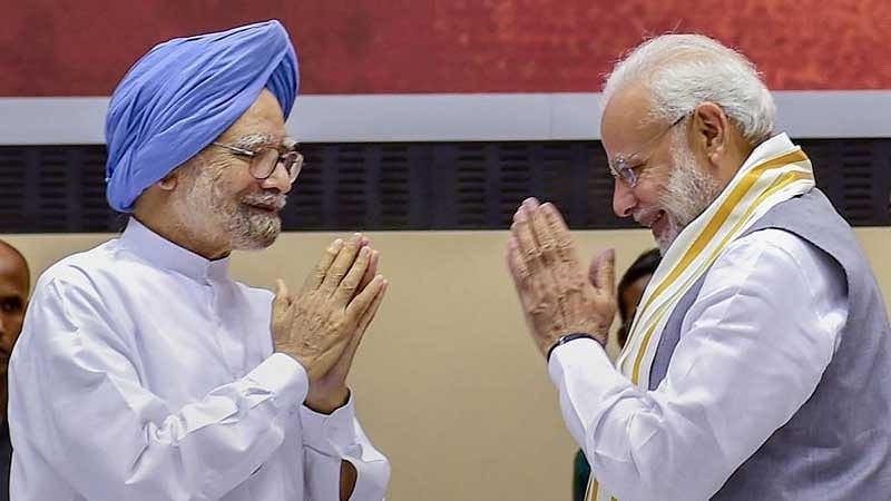 <div class="paragraphs"><p>File Photo: Former prime minister Manmohan Singh with Prime Minister Narendra Modi.</p></div>