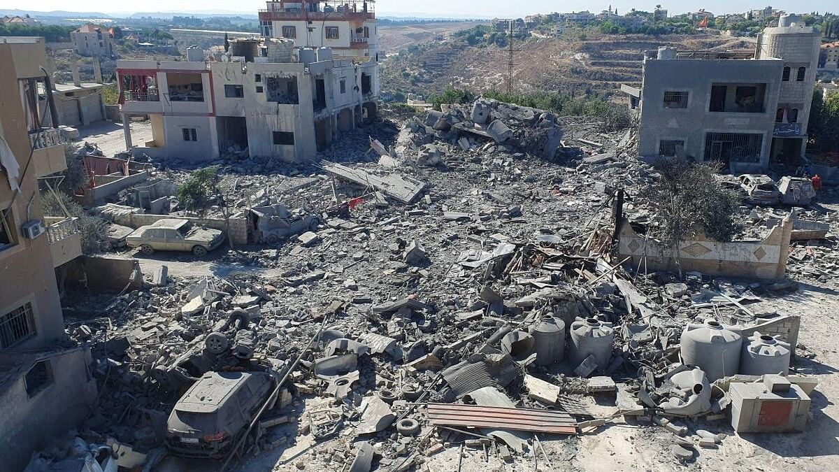 <div class="paragraphs"><p>The rubble of destroyed buildings lies at the site of Israeli strikes in Saksakiyeh, southern Lebanon September 26, 2024.</p></div>