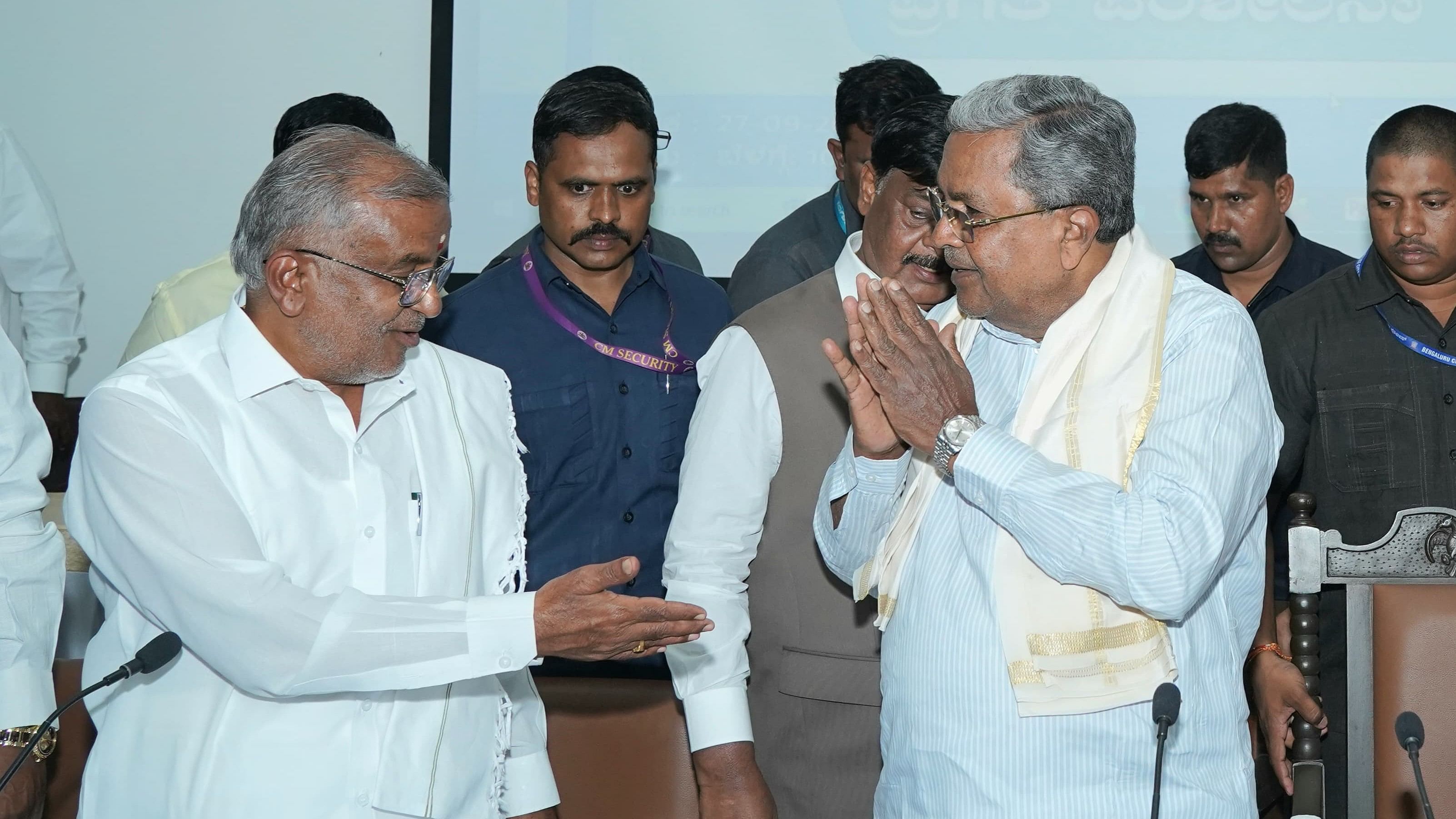 <div class="paragraphs"><p>Chief Minister Siddaramaiah greets MLA G T Devegowda during the district-level Karnataka Development Programme progress review meeting, at Zilla Panchayat Hall, in Mysuru, on Friday.</p></div>