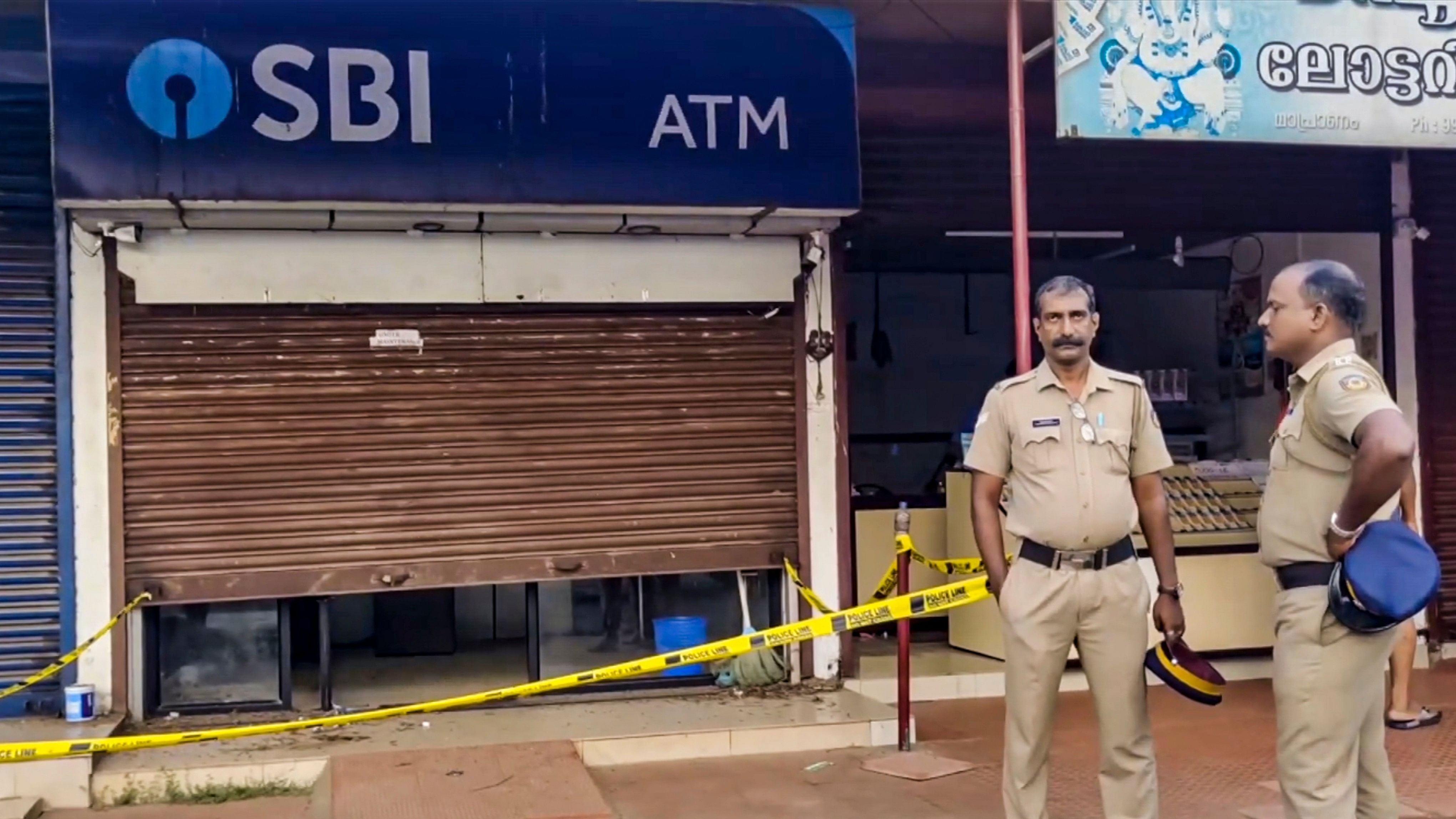 <div class="paragraphs"><p>Police investigate after four-member gang broke open three ATMs run by the State Bank of India (SBI) using a gas-cutter, in Thrissur.</p></div>