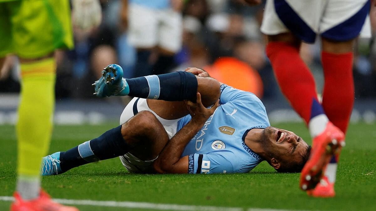 <div class="paragraphs"><p>Manchester City's Rodri reacts after sustaining an injury.</p></div>