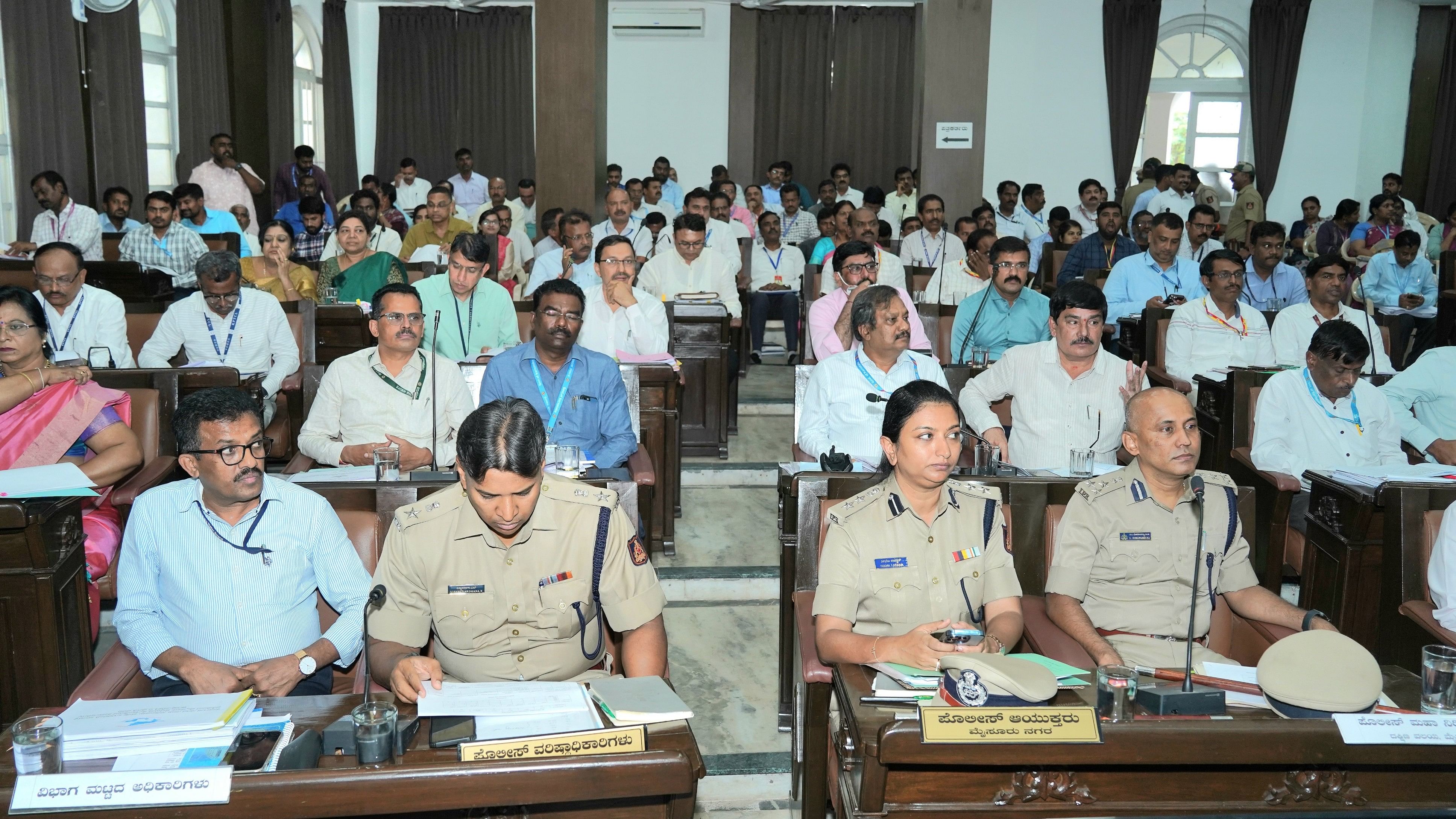 <div class="paragraphs"><p>Officials during the district-level Karnataka Development Programme (KDP) progress review meeting, chaired by Chief Minister Siddaramaiah, in Mysuru, on Friday. </p></div>