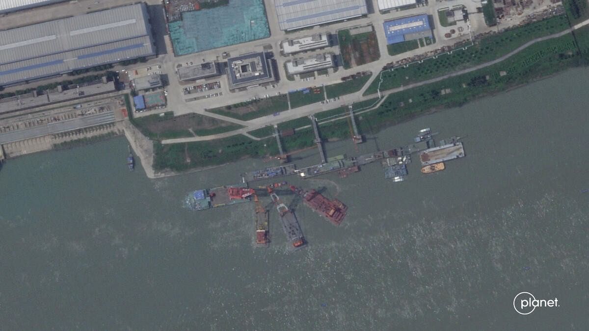 <div class="paragraphs"><p>A series of satellite images from Planet Labs from June appear to show cranes at the Wuchang shipyard, where the submarine would have been docked.</p></div>