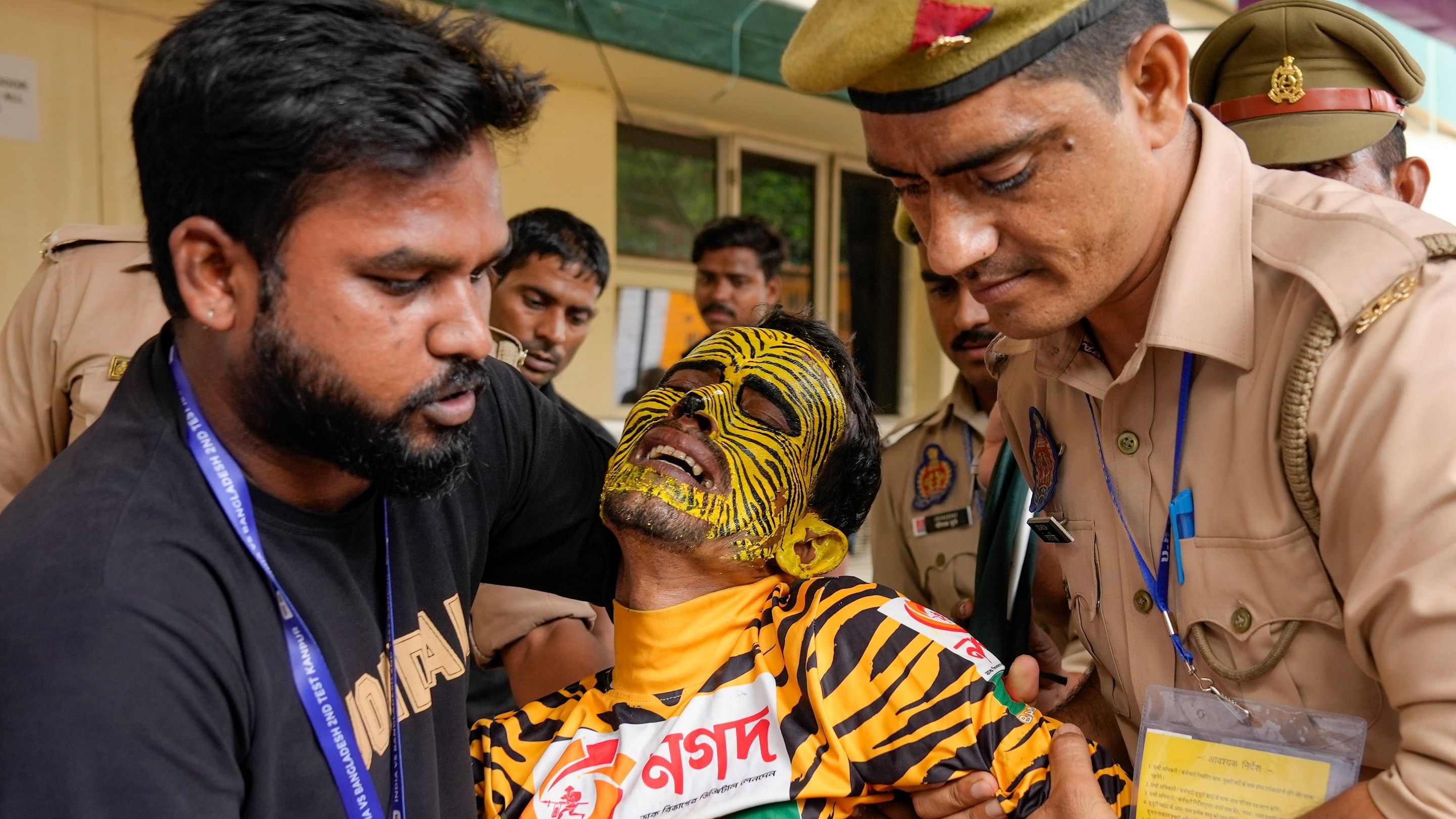 <div class="paragraphs"><p>A Bangladeshi supporter after he was heckled by miscreants during the first day of the 2nd cricket Test match between India and Bangladesh at the Green Park Stadium, in Kanpur, Friday, September 27, 2024.    </p></div>