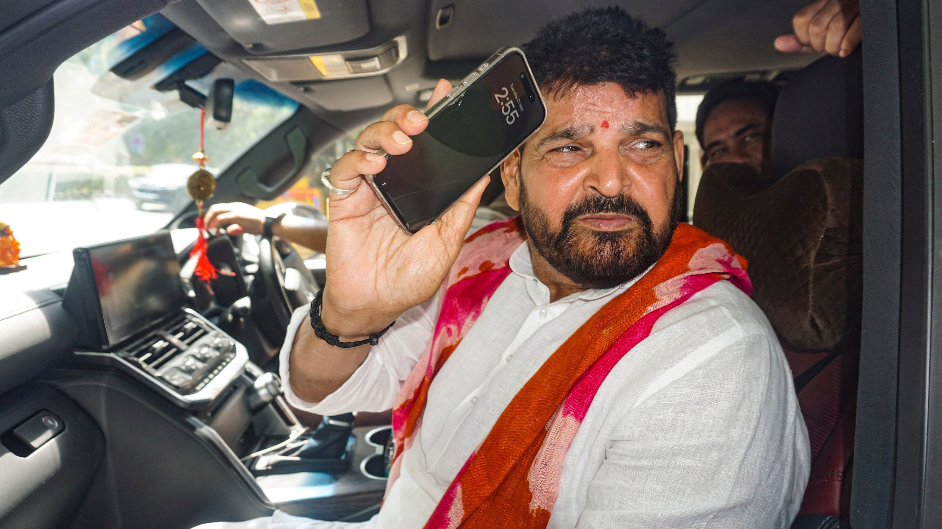 <div class="paragraphs"><p>Former Wrestling Federation of India (WFI) chief and BJP leader Brij Bhushan Sharan Singh leaves the Rouse Avenue Court after the Court framed charges against him in an alleged sexual harassment case lodged by female wrestlers, in New Delhi, Tuesday, May 21, 2024. </p></div>