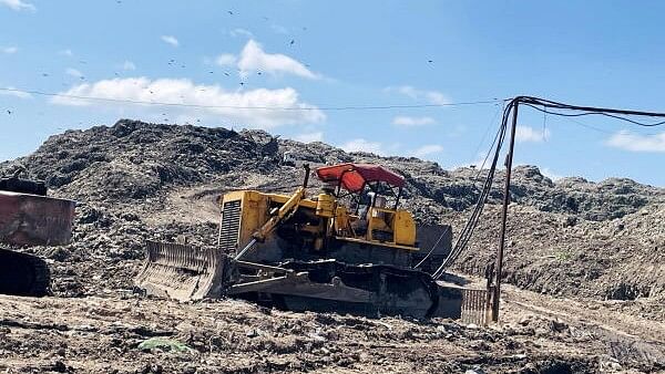 <div class="paragraphs"><p>An excavator at Bandhwari landfill on Gurugram-Faridabad road, in Gurugram.</p></div>