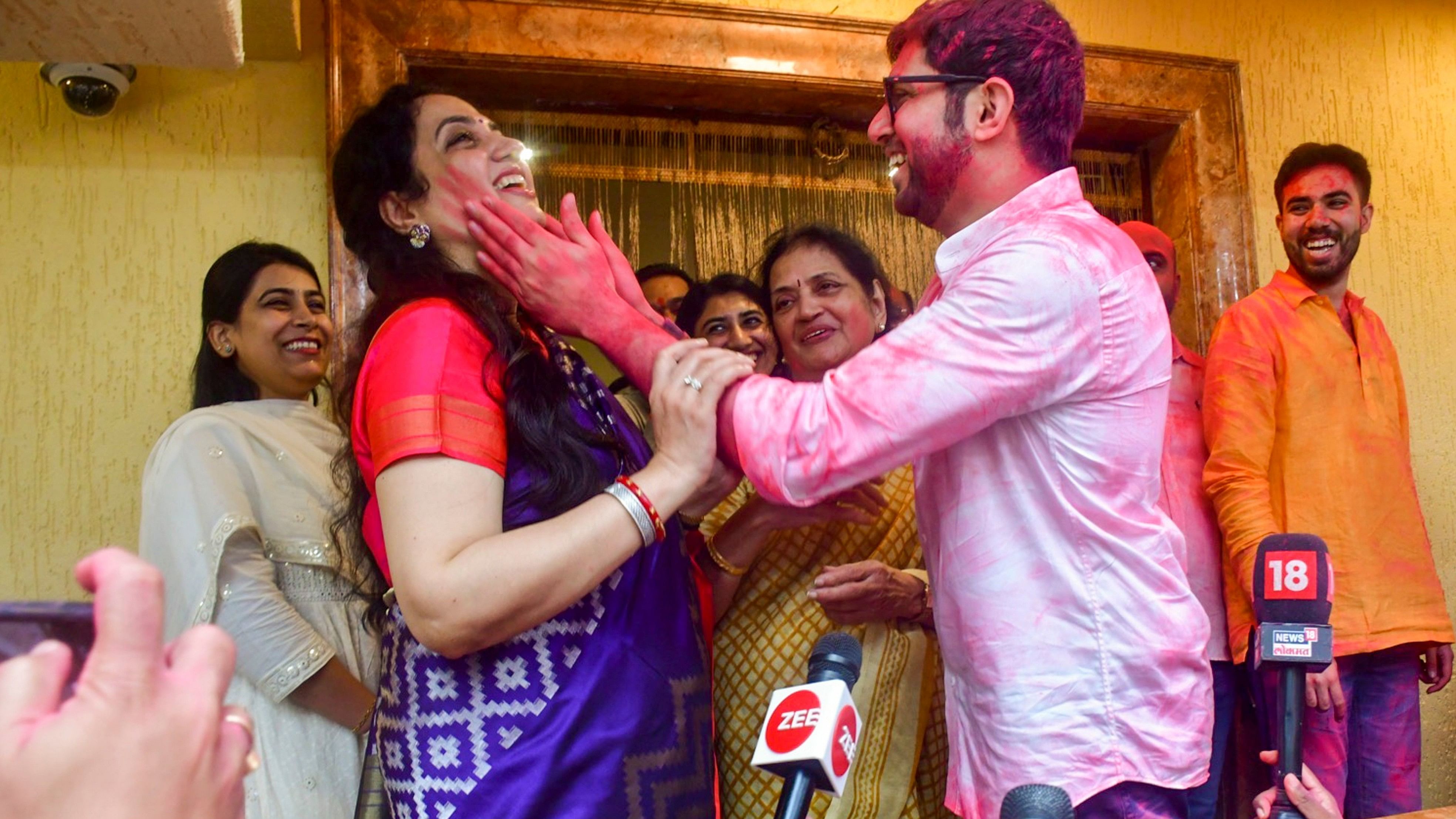 <div class="paragraphs"><p>Shiv Sena (UBT) Chief Uddhav Thackeray's wife Rashmi Thackeray with Yuva Sena's Chief Aaditya Thackeray during celebrations after the Sena won all seats in Mumbai University's Senate elections, in Mumbai, Saturday, Sept. 28, 2024.</p></div>