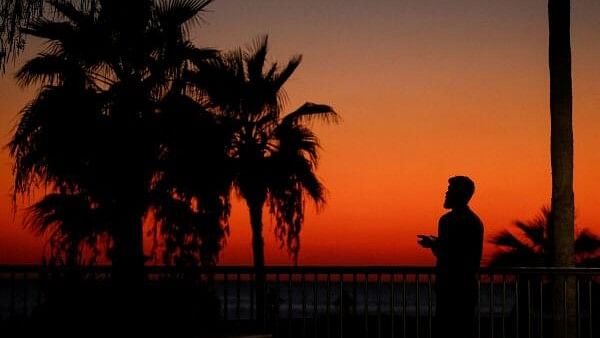 <div class="paragraphs"><p>A man prays at sunset, amid ongoing cross-border hostilities between Hezbollah and Israeli forces, in Tyre, Lebanon September 27, 2024. </p></div>