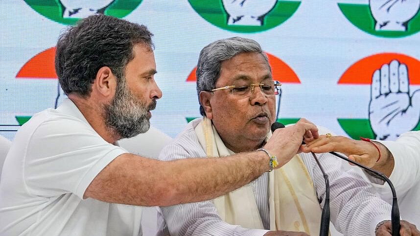 <div class="paragraphs"><p>Rahul Gandhi with Karnataka CM Siddaramaiah.</p></div>