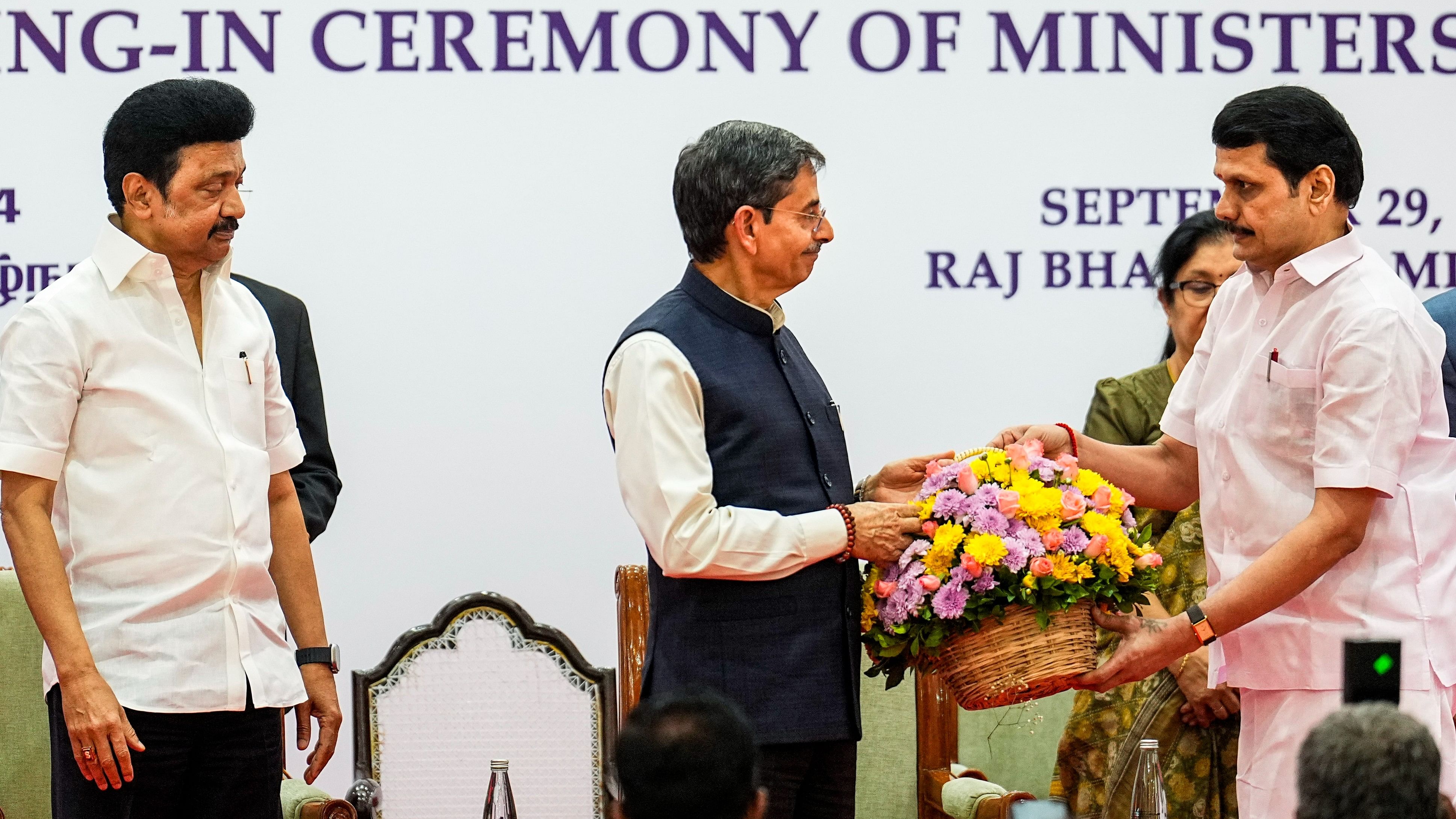 <div class="paragraphs"><p>Tamil Nadu Governor RN Ravi being greeted by V Senthil Balaji after the latter took oath as Minister, as Chief Minister MK Stalin looks on, at Raj Bhavan in Chennai, Saturday.</p></div>