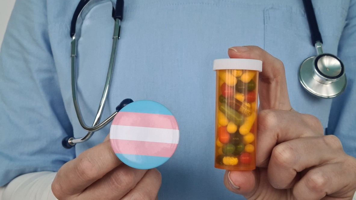 <div class="paragraphs"><p>Image showing a doctor holding the transgender flag and a bottle of pills. For representational purposes.</p></div>