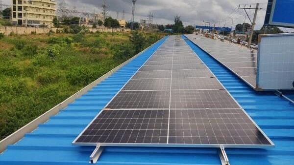 <div class="paragraphs"><p>Solar panels over the EV-charging station near the KIA.&nbsp;</p></div>