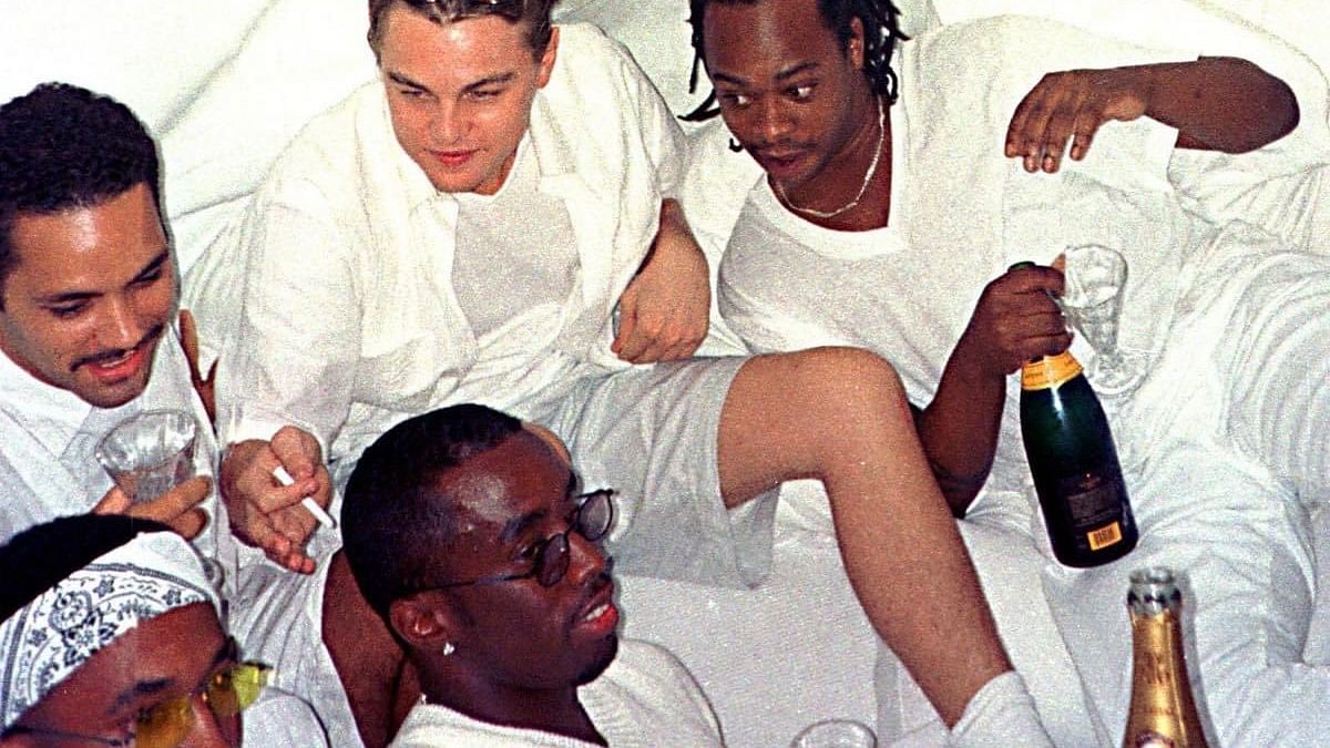 <div class="paragraphs"><p>Leonardo DiCaprio can be seen with Sean Combs at one of his parties</p></div>