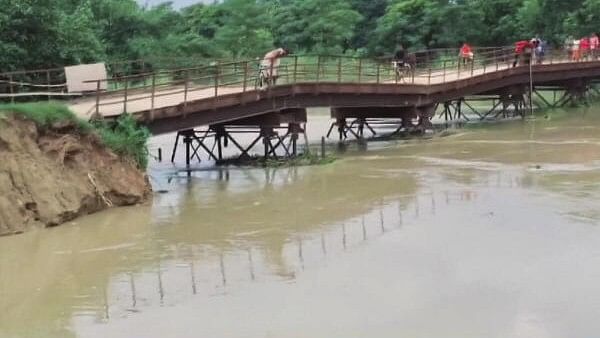 <div class="paragraphs"><p>The water level of Tiyar river rises after heavy rains, in Motihari, Bihar, Monday.&nbsp;</p></div>