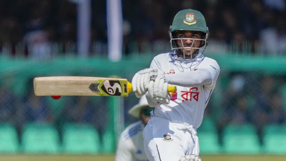 <div class="paragraphs"><p>Bangladesh's batter Mominul Haque plays shot during the fourth day of the 2nd Test cricket match between India and Bangladesh, at the Green Park stadium, Kanpur, Monday, Sept. 30, 2024.</p></div>