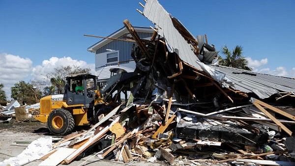 <div class="paragraphs"><p>A man operating a front loader clears a home from the road that was destroyed in Keaton Beach after Hurricane Helene passed through the Florida panhandle, severely impacting the community in Keaton Beach, Florida.&nbsp;</p></div>