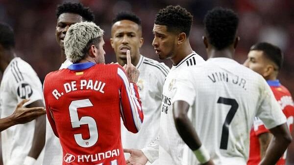 <div class="paragraphs"><p>Real Madrid's Jude Bellingham and Atletico Madrid's Rodrigo De Paul react.</p></div>