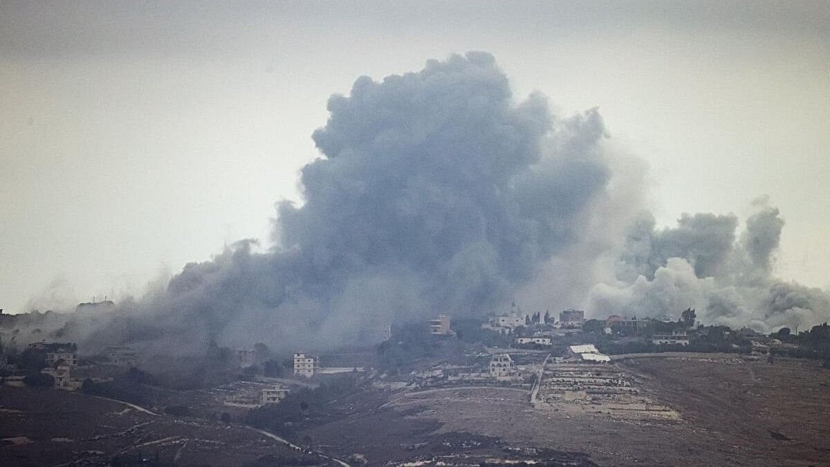 <div class="paragraphs"><p>Smoke billows after an Israeli Air Force air strike on a village in southern Lebanon.</p></div>