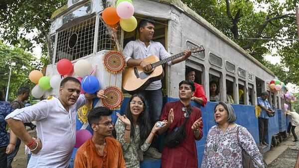 <div class="paragraphs"><p>Tram lovers perform a song as part of a campaign to save tram services in the city, at Esplanade tram depot in Kolkata.</p></div>