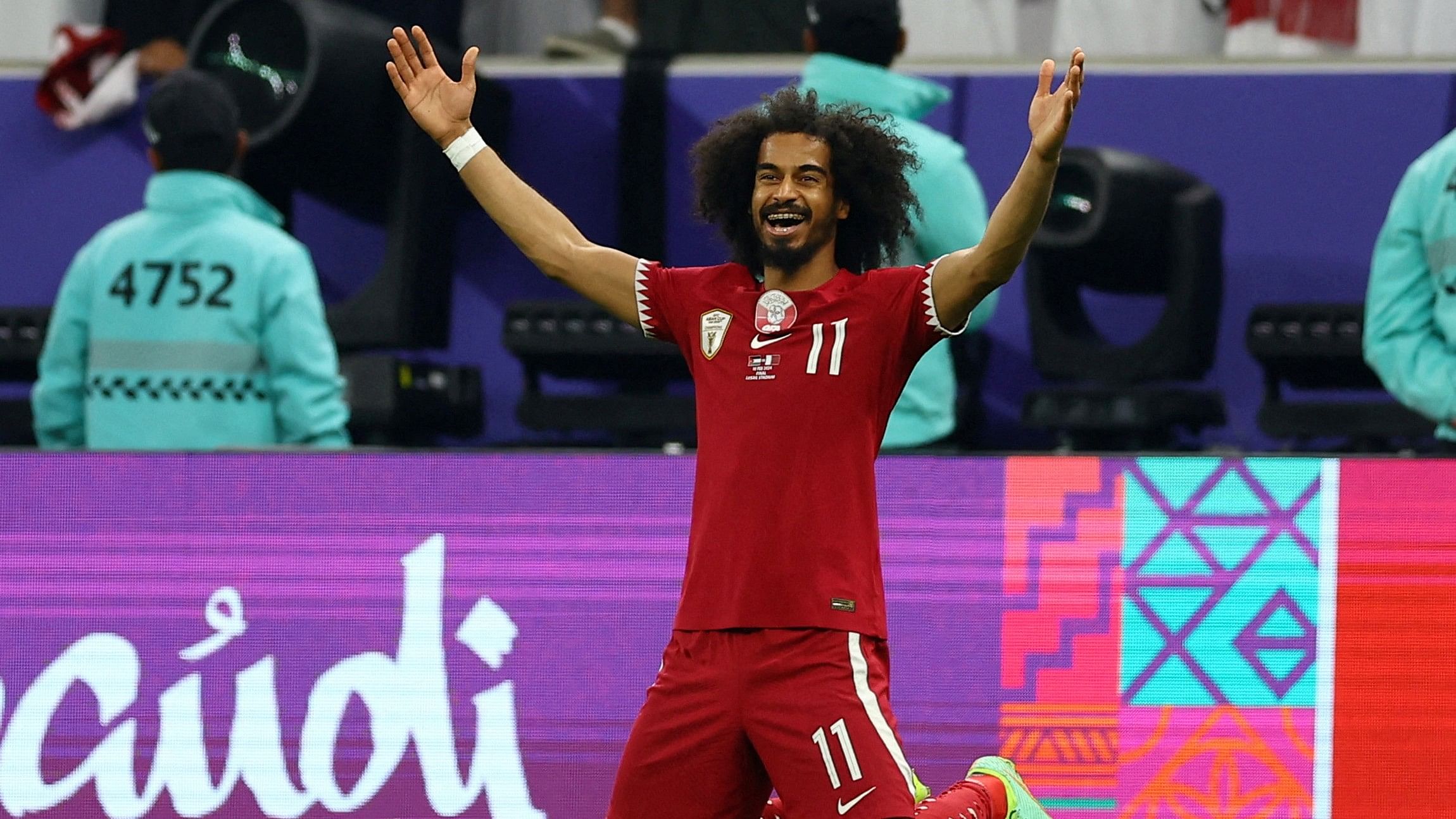 <div class="paragraphs"><p>Qatar's Akram Afif celebrates after winning the AFC Asian Cup</p></div>