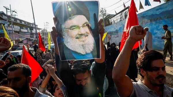 <div class="paragraphs"><p>Kashmiri Shia Muslims shout slogans during a protest against Israel following the killing of Lebanon's Hezbollah leader Sayyed Hassan Nasrallah in an Israeli air strike in Beirut, on the outskirts of Srinagar</p></div>